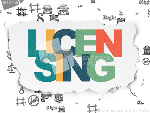 Image of Law concept: Licensing on Torn Paper background