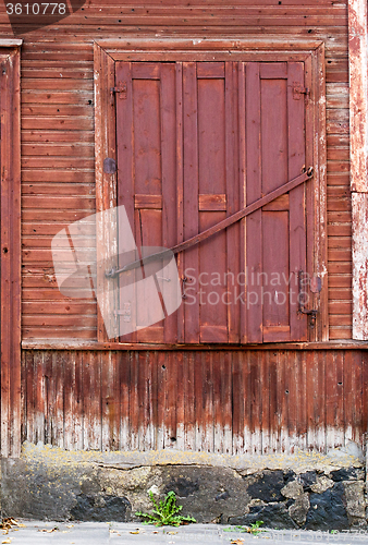 Image of Window with closed shutters