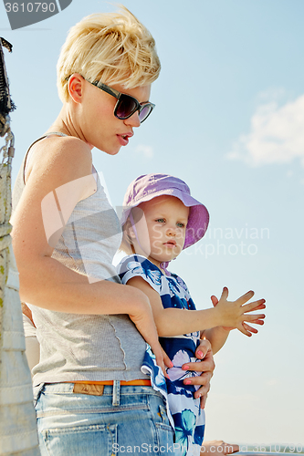 Image of Mother, daughter on yacht.  Concept of the family