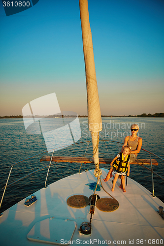 Image of Mother, daughter on yacht.  Concept of the family
