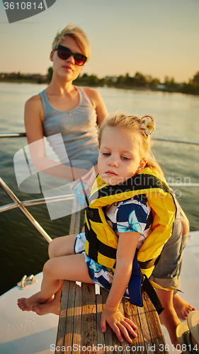 Image of Mother, daughter on yacht.  Concept of the family