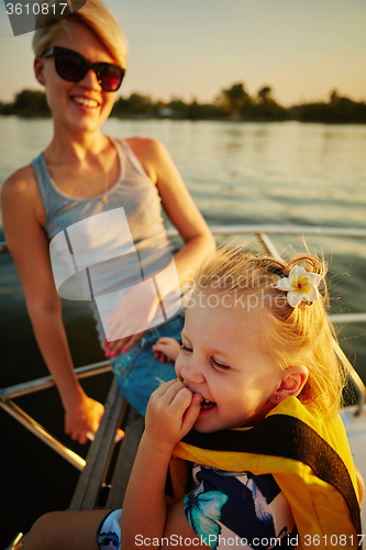 Image of Mother, daughter on yacht.  Concept of the family