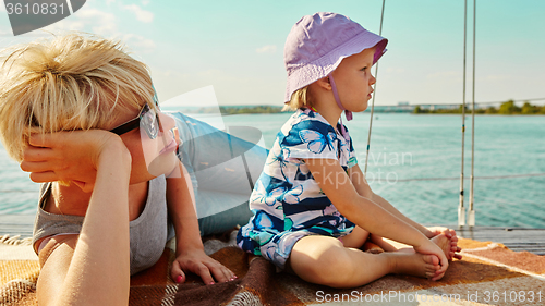 Image of Mother, daughter on yacht.  Concept of the family