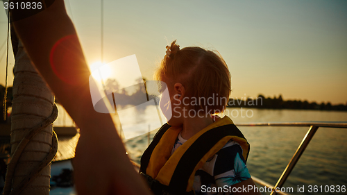 Image of Little girl enjoying ride on yacht