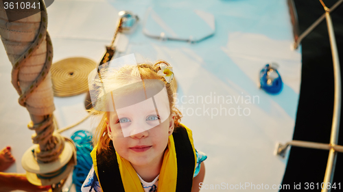 Image of Little girl enjoying ride on yacht