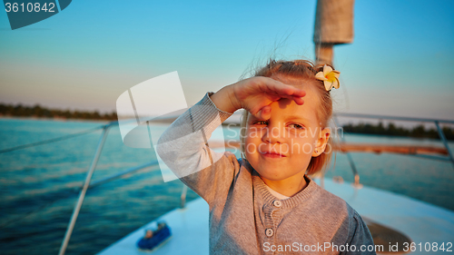 Image of Little girl enjoying ride on yacht