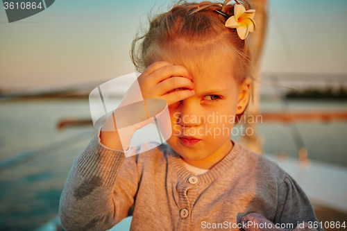 Image of Little girl enjoying ride on yacht