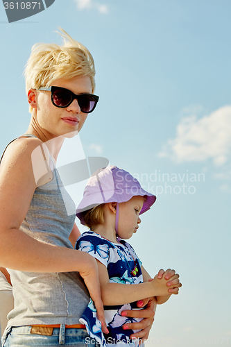 Image of Mother, daughter on yacht.  Concept of the family