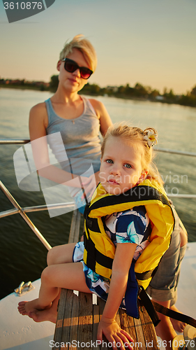 Image of Mother, daughter on yacht.  Concept of the family