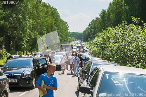 Image of Traffic jam on road to military exhibition