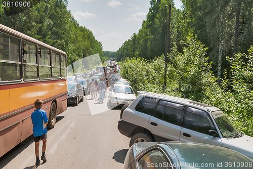 Image of Traffic jam on road to military exhibition