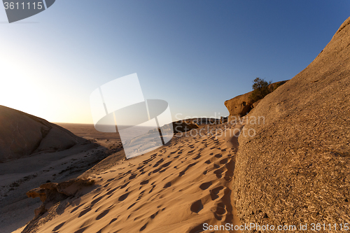 Image of Rock formation in Namib desert in sunset, landscape