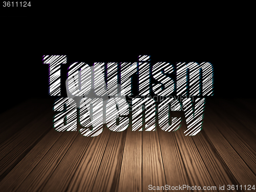 Image of Vacation concept: Tourism Agency in grunge dark room