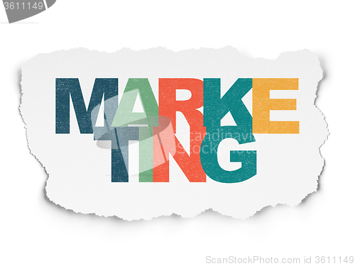 Image of Advertising concept: Marketing on Torn Paper background