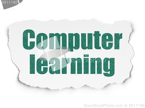 Image of Education concept: Computer Learning on Torn Paper background