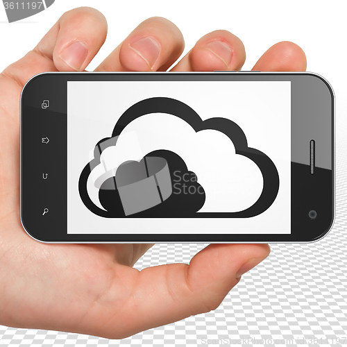 Image of Cloud technology concept: Hand Holding Smartphone with Cloud on display