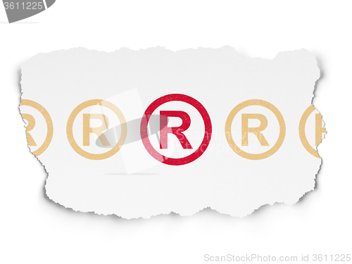 Image of Law concept: registered icon on Torn Paper background