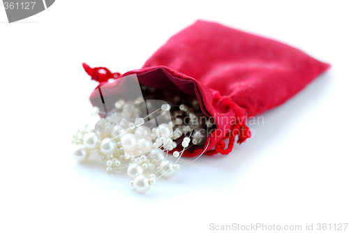 Image of Pearls in red pouch