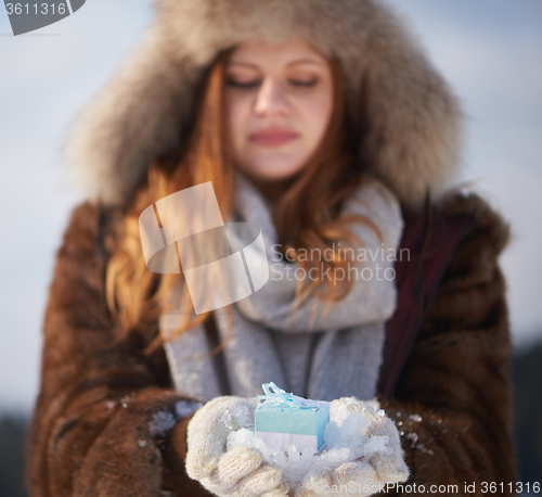 Image of winter girl with gift