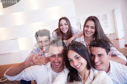 Image of group of friends taking selfie