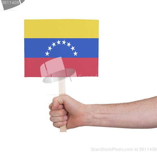 Image of Hand holding small card - Flag of Venezuela