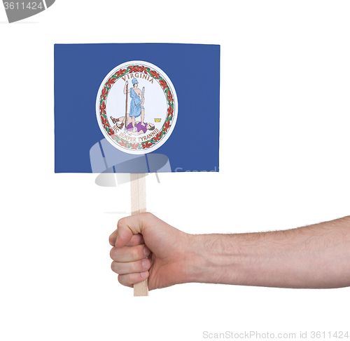 Image of Hand holding small card - Flag of Virginia