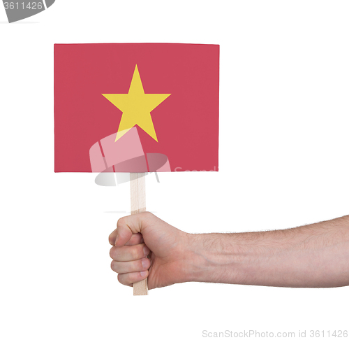 Image of Hand holding small card - Flag of Vietnam