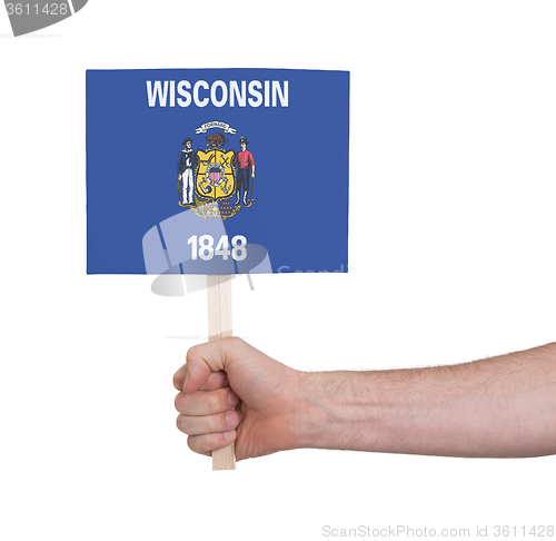 Image of Hand holding small card - Flag of Wisconsin