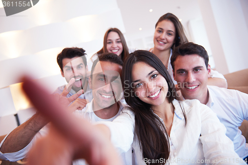 Image of group of friends taking selfie