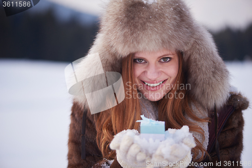 Image of winter girl with gift