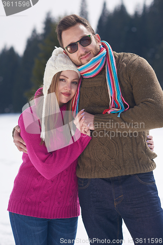 Image of romantic young couple on winter vacation