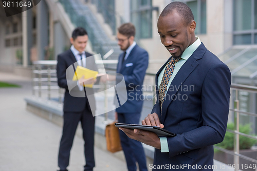 Image of The business black man with laptop