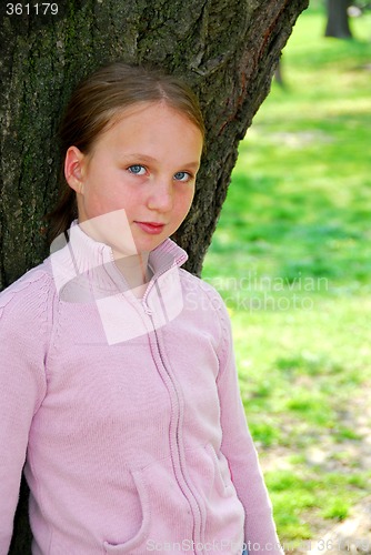 Image of Girl and big tree