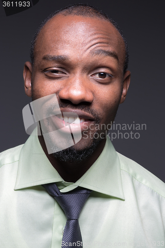 Image of portrait of handsome young black african smiling man