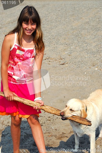 Image of Girl play dog