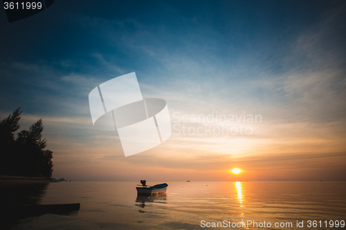 Image of Sunset over the tropical beach. 