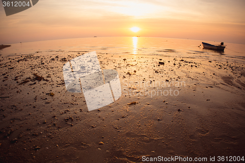 Image of Sunset over the tropical beach. 