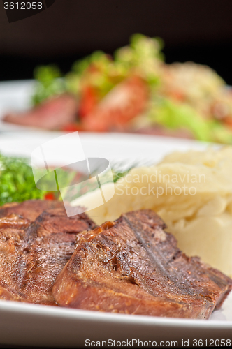 Image of tongue with grilled vegetable
