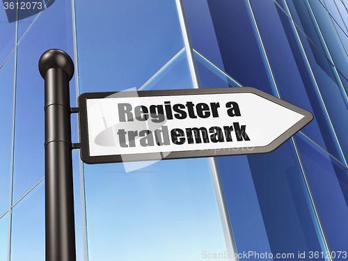 Image of Law concept: sign Register A Trademark on Building background