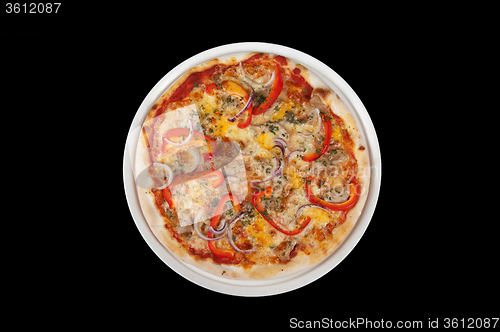 Image of meat pizza on black