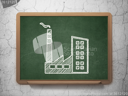 Image of Industry concept: Industry Building on chalkboard background