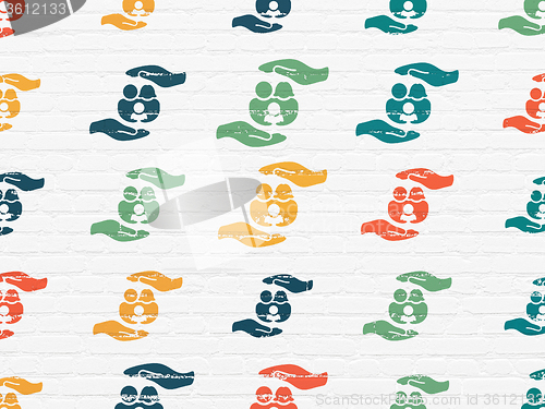 Image of Insurance concept: Family And Palm icons on wall background