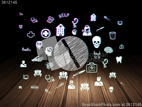 Image of Health concept: Pill in grunge dark room