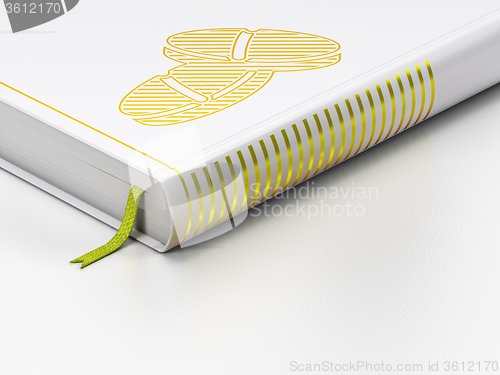 Image of Healthcare concept: closed book, Pills on white background