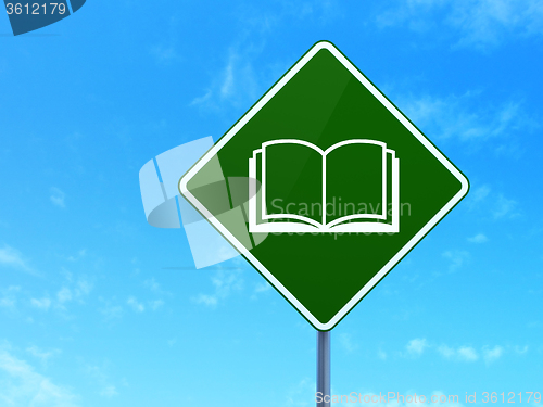 Image of Science concept: Book on road sign background