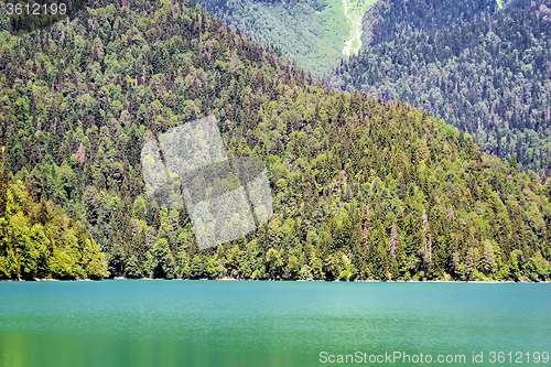 Image of A picturesque lake surrounded by high mountains.