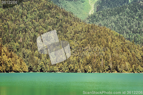 Image of A picturesque lake surrounded by high mountains.