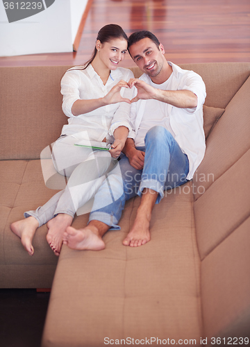 Image of happy young romantic couple have fun and  relax at home