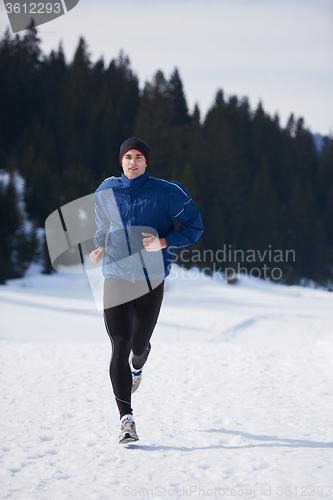 Image of jogging on snow in forest