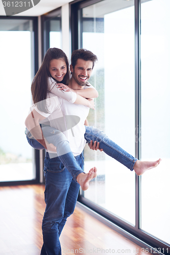 Image of happy young romantic couple have fun and  relax at home